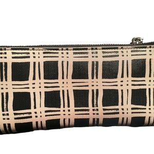 Black and cream plaid leather coach wallet.